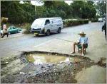Click image for larger version

Name:	pothole.jpg
Views:	305
Size:	15.9 KB
ID:	7806