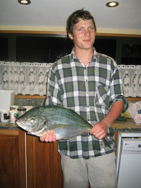 daniel with a travelley that we caught off our 10 ft dinghy